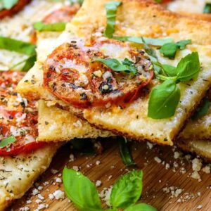 Roasted Tomato Basil Pizza is a pizza recipe with roasted tomatoes and fresh basil