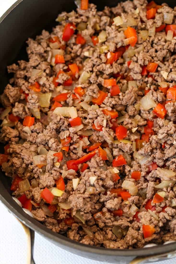 ground beef, onions and peppers in a skillet to make beef goulash