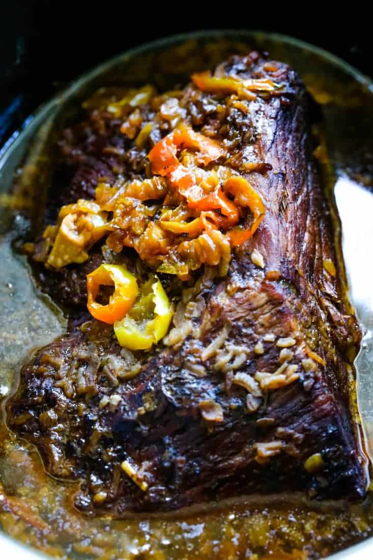 Pile this addicting Slow Cooker Italian Beef onto sub rolls, serve with mashed potatoes on the side or eat as is for a low carb meal! rump roast cooked in a crock pot after cooking