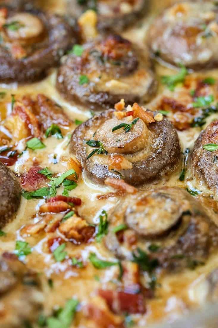 Our Creamy Bacon Mushrooms are cooked in the most addicting cream sauce! Spoon over steak or chicken, even makes an amazing pasta sauce! mushrooms with bacon in a cream sauce