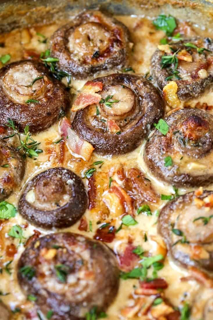 mushrooms with bacon in a parmesan cream sauce