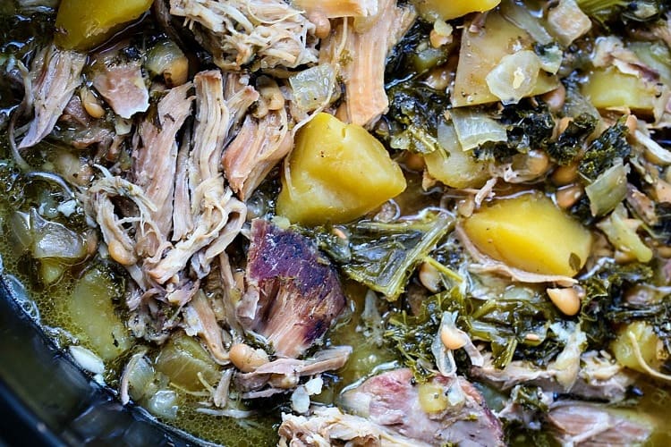 slow cooker with shredded pork and potatoes