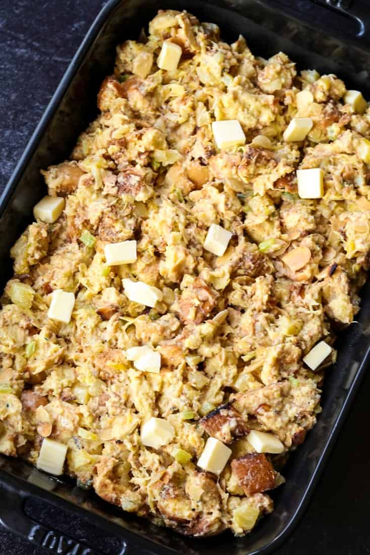 pineapple stuffing recipe in a black dish before baking
