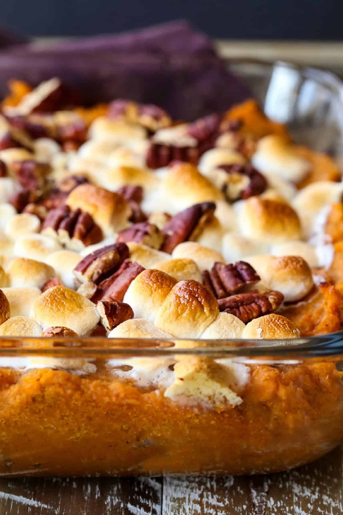 sweet potato casserole in a glass baking dish from the side