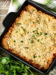 cauliflower gratin with fresh parsley and a green and white napkin