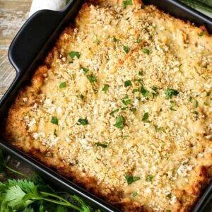 cauliflower gratin with fresh parsley and a green and white napkin