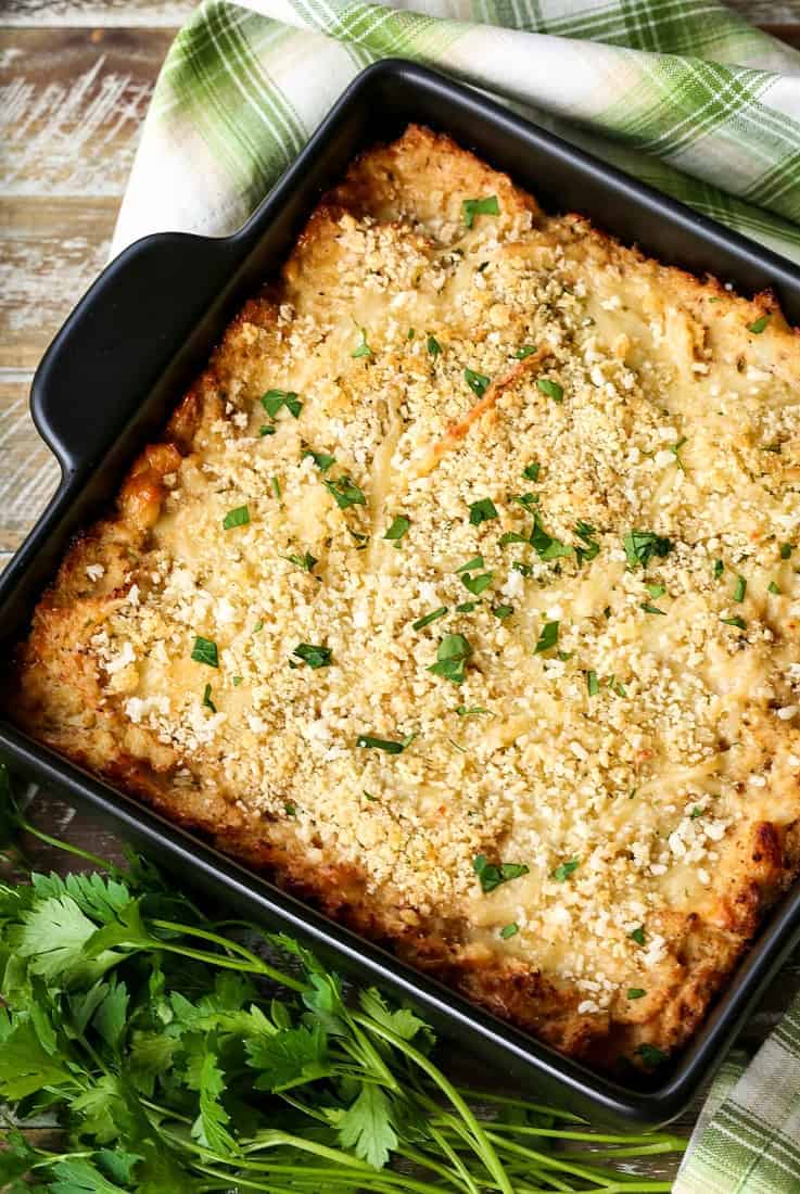 cauliflower gratin with fresh parsley and a green and white napkin