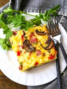 Western Hash Brown Casserole on w white plate with forks