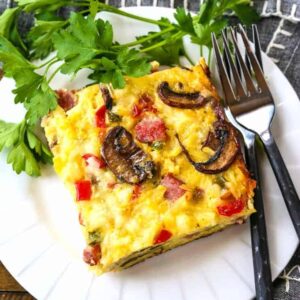 Western Hash Brown Casserole on w white plate with forks