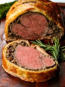 Beef tenderloin wrapped in puff pastry with creamy minced mushrooms.