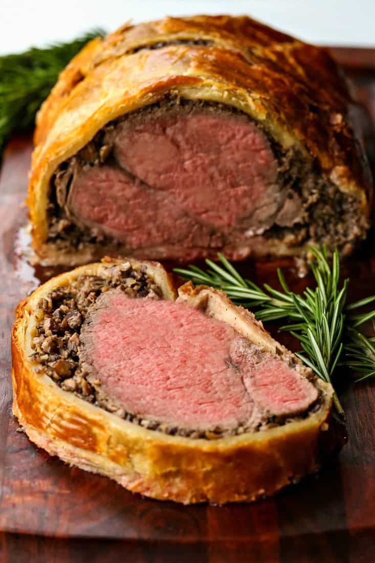 Beef tenderloin wrapped in puff pastry with creamy minced mushrooms.