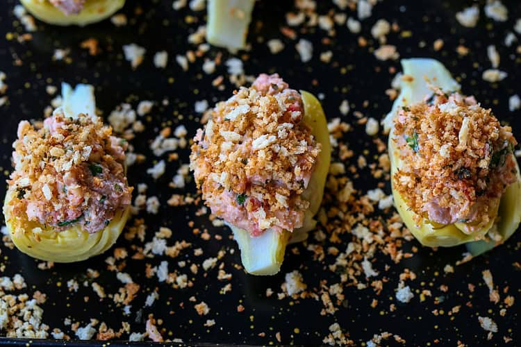 Sausage Stuffed Artichoke Hearts on a baking sheet before the oven