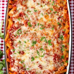 baked ziti recipe on a red and white checkered table cloth