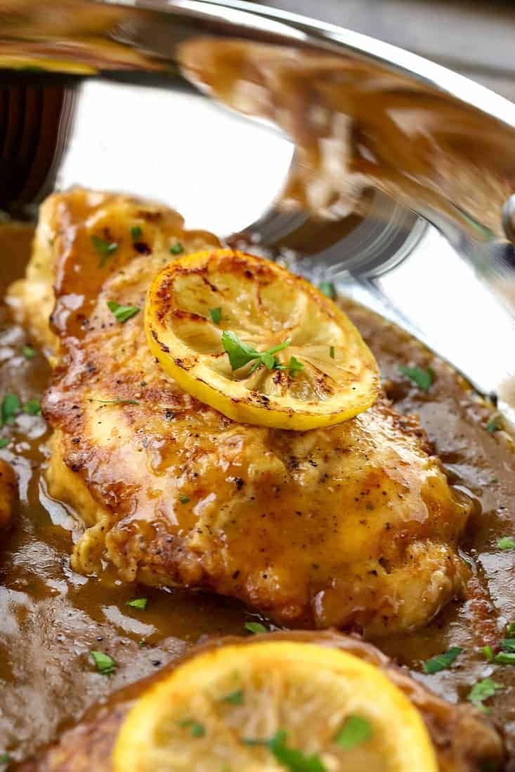 Chicken Francese recipe in a skillet with sauce