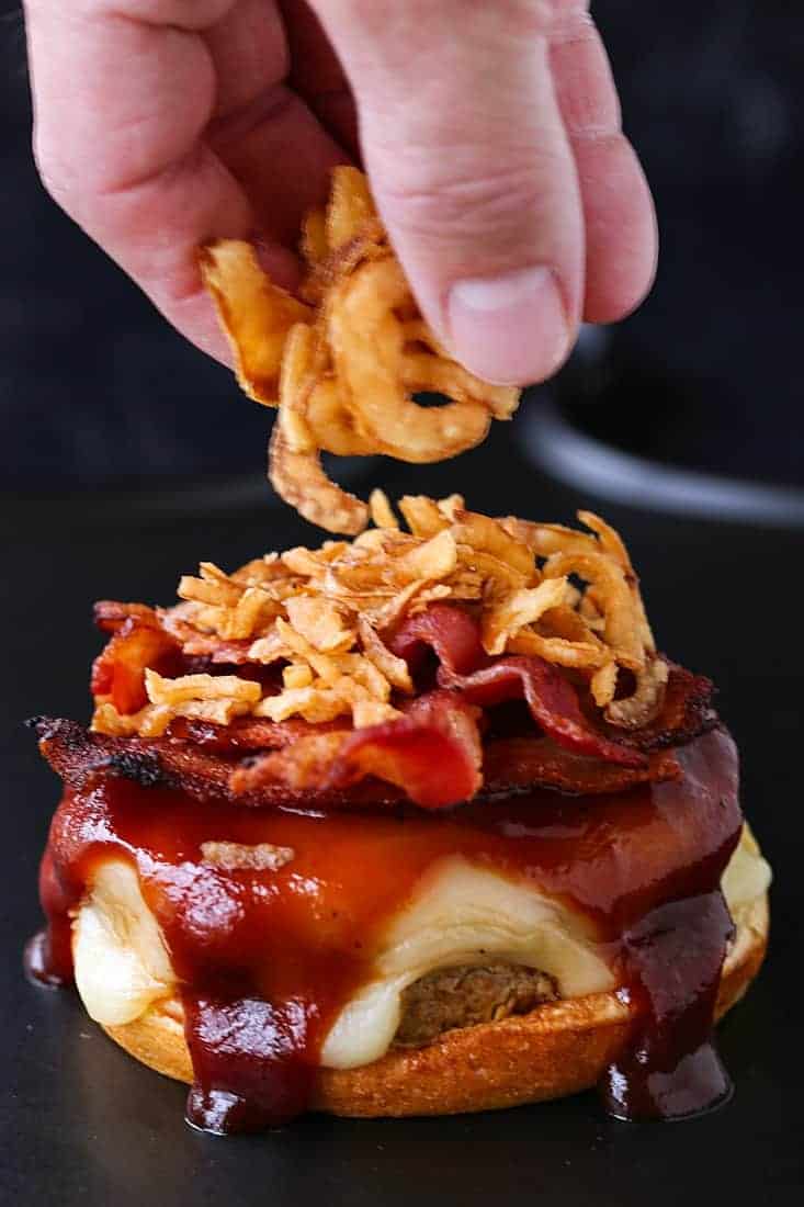 Fried onions on top of turkey burger