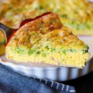 Crustless Quiche recipe with a wedge on a pie serve