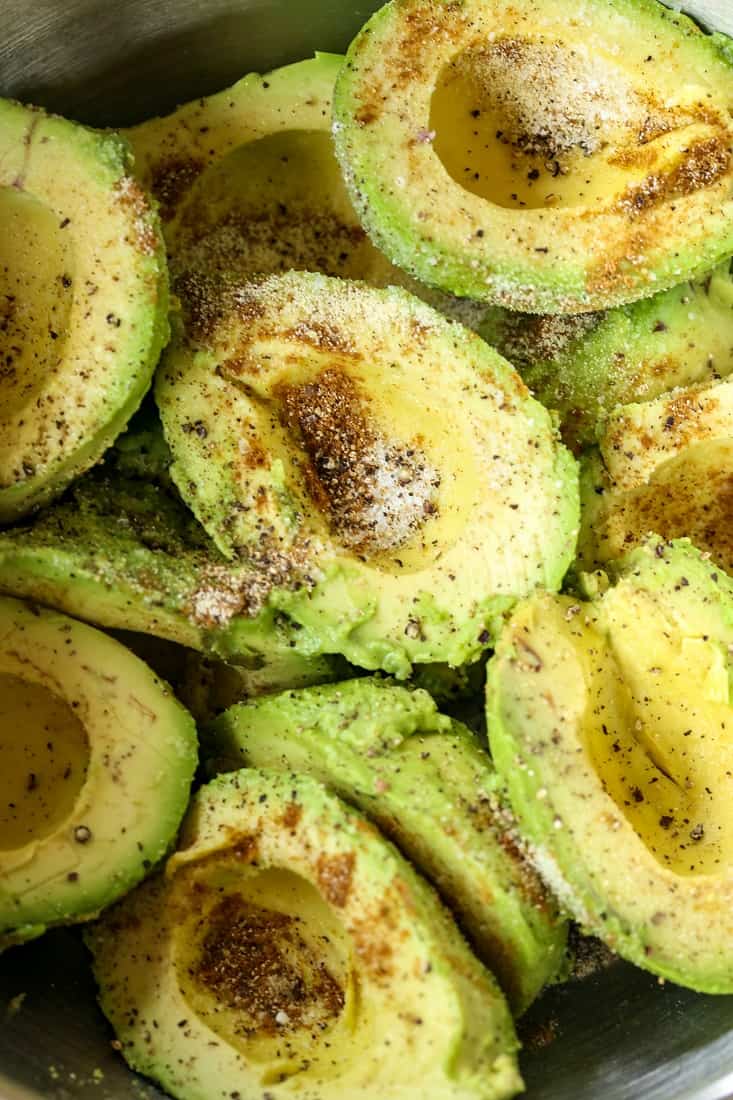 Avocados in a bowl to make homemade guacamole