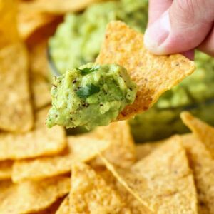 Homemade Guacamole on a tortilla chip