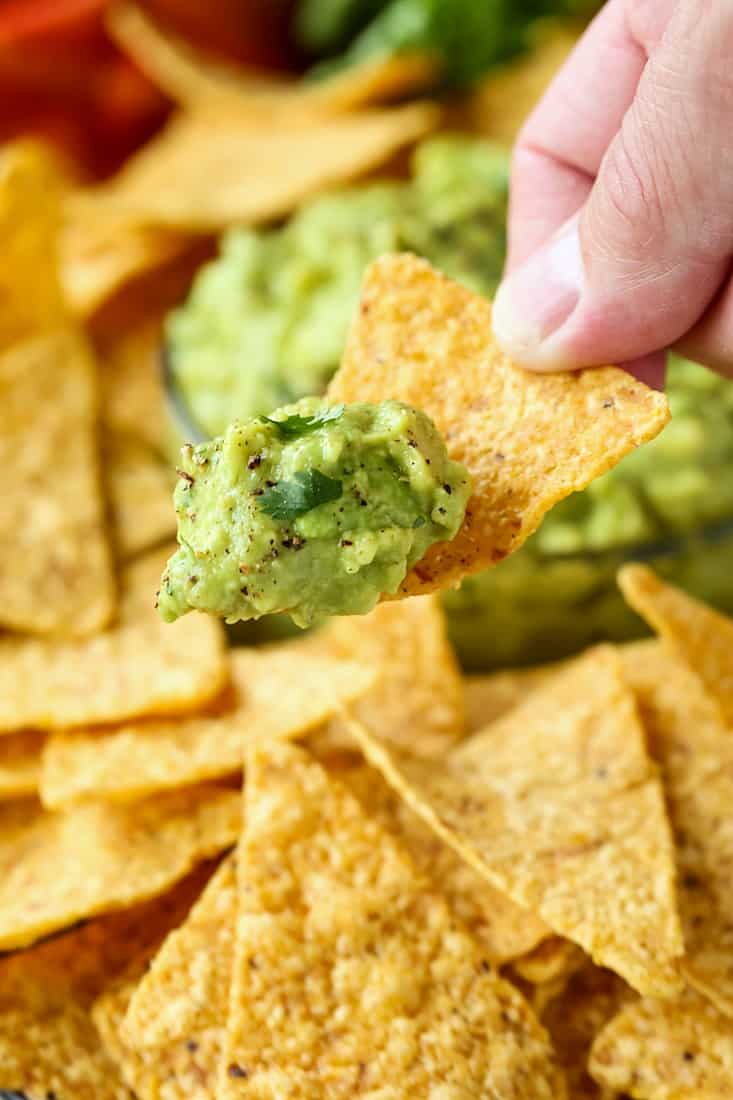 Homemade Guacamole on a tortilla chip