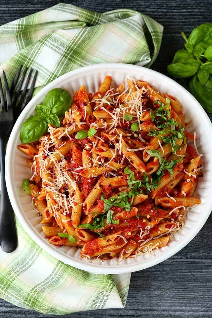 Pasta Arrabbiata in a bowl with forks