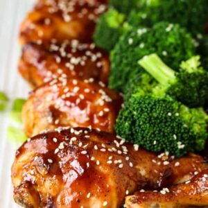 Chicken legs baked with an Asian flavored glaze served with broccoli