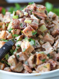 potato salad made with roasted potatoes in a creamy bbq dressing