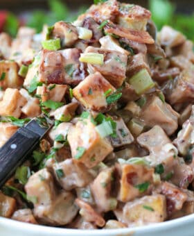 potato salad made with roasted potatoes in a creamy bbq dressing
