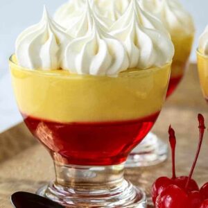 Boozy Cinnamon Toast Crunch Jello with spoons and cherries
