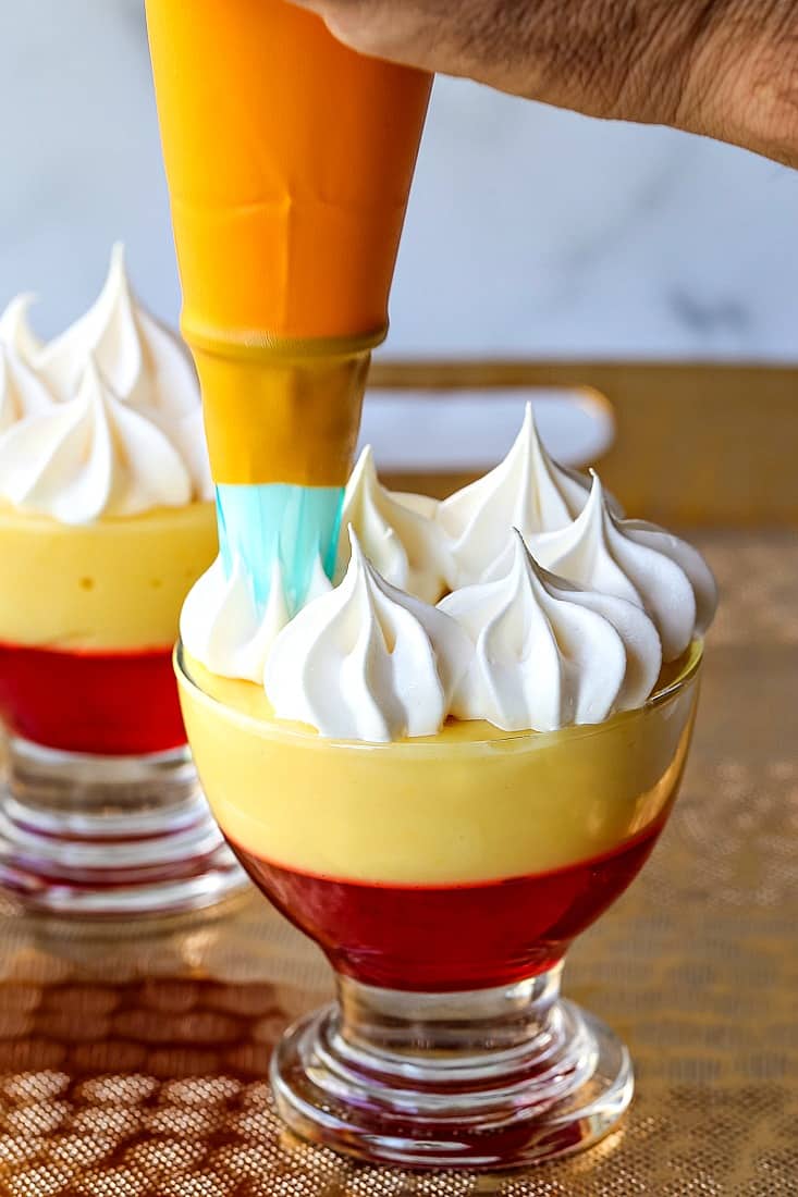 Cinnamon Toast Crunch Jello Dessert with piping bag for the topping