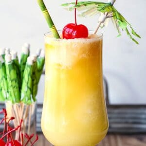 A Pina Colada drink with umbrella garnish