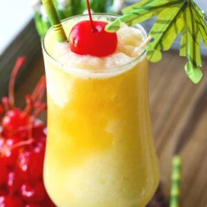 pina colada recipe with cherry and umbrella garnish