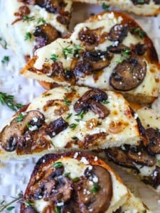 Mushroom and Thyme Cheese Bread appetizers sliced on platter