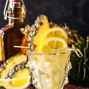 Whiskey lemonade cocktail with pineapple garnish