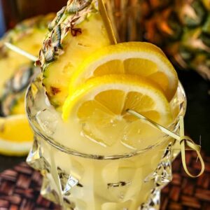 Pineapple Whiskey Lemonade with fresh pineapple garnish