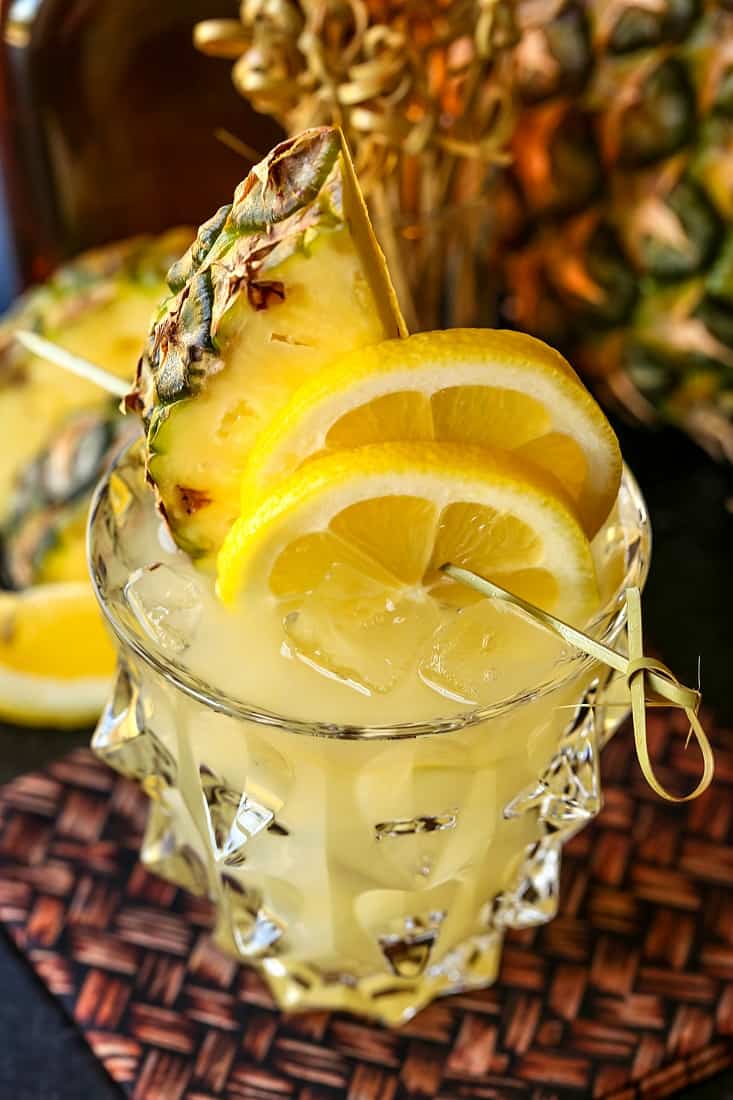Pineapple Whiskey Lemonade with fresh pineapple garnish
