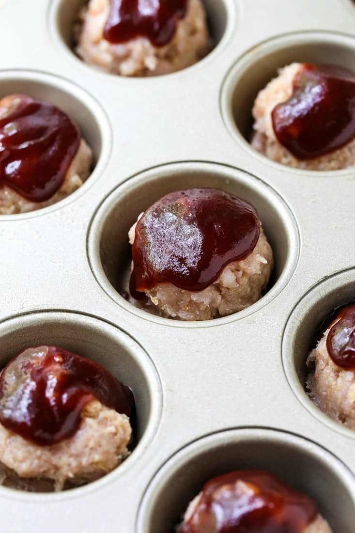 meatloaf recipe in a muffin pan before baking