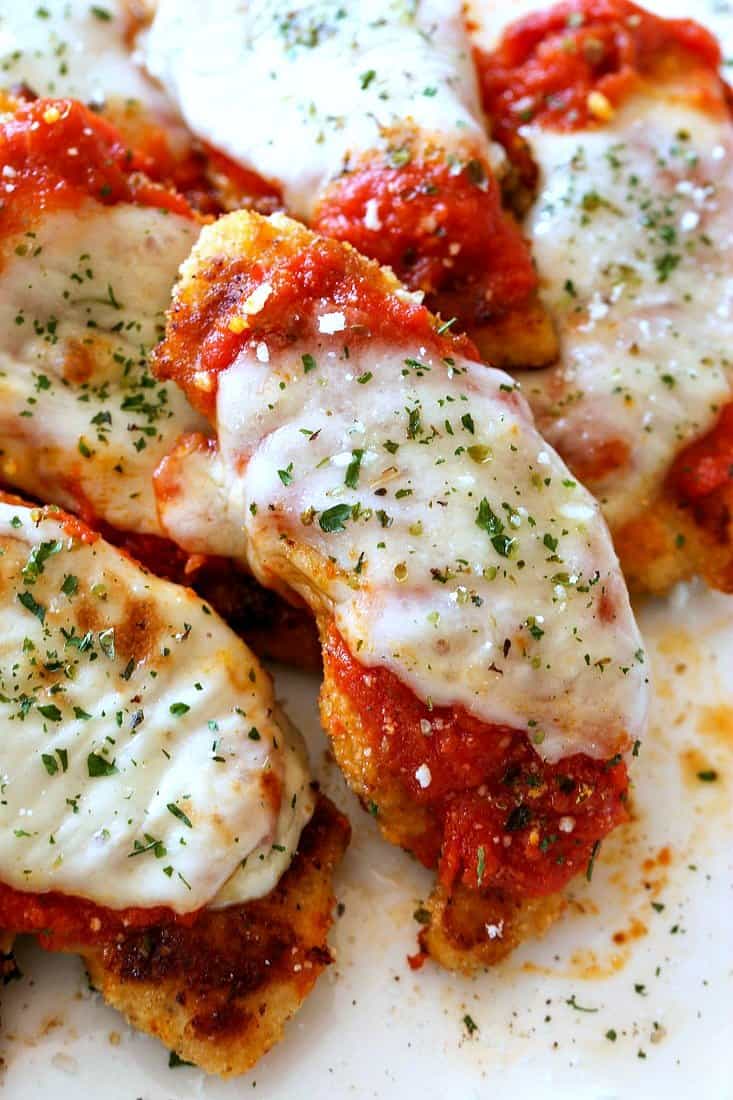 Baked chicken tenderloin topped with marinara sauce and mozzarella cheese