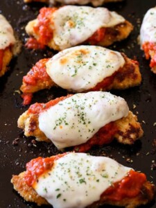 Parmesan Chicken Tenderloins on a baking sheet