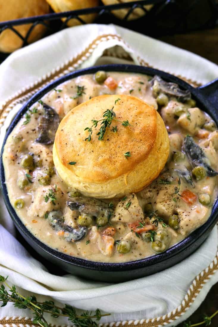 You only need ten minutes to start this Crock Pot Chicken Pot Pie! Super creamy sauce with tender chicken and veggies, topped with a biscuit! Crock Pot Chicken Pot Pie with a biscuit topper