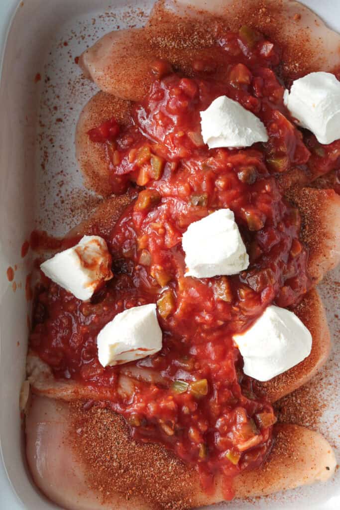 chicken breasts, salsa and cream cheese in slow cooker