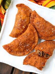 beef empanadas on a white platter