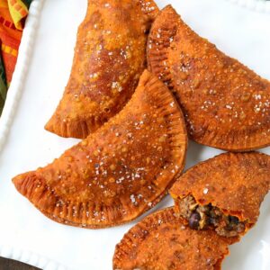 beef empanadas on a white platter