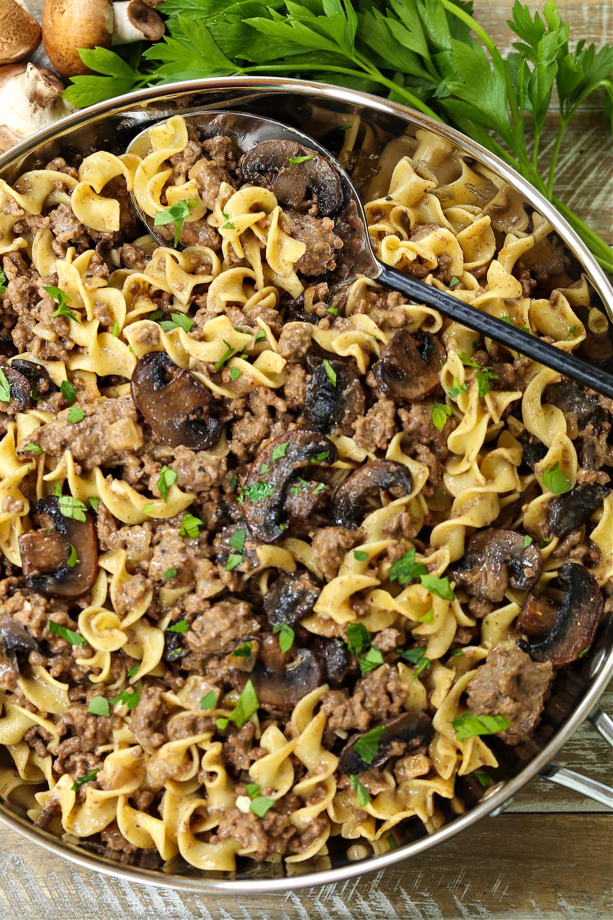 ground beef stroganoff on plate with noodles