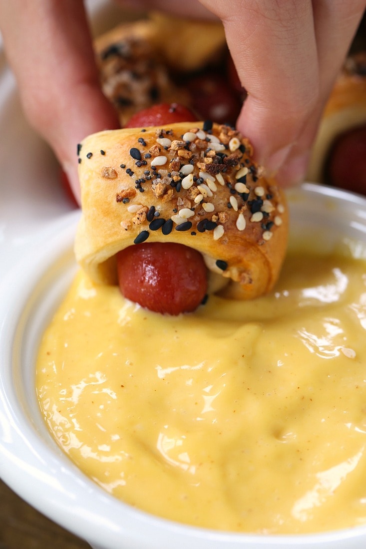 Pigs in a blanket dipped in honey mustard