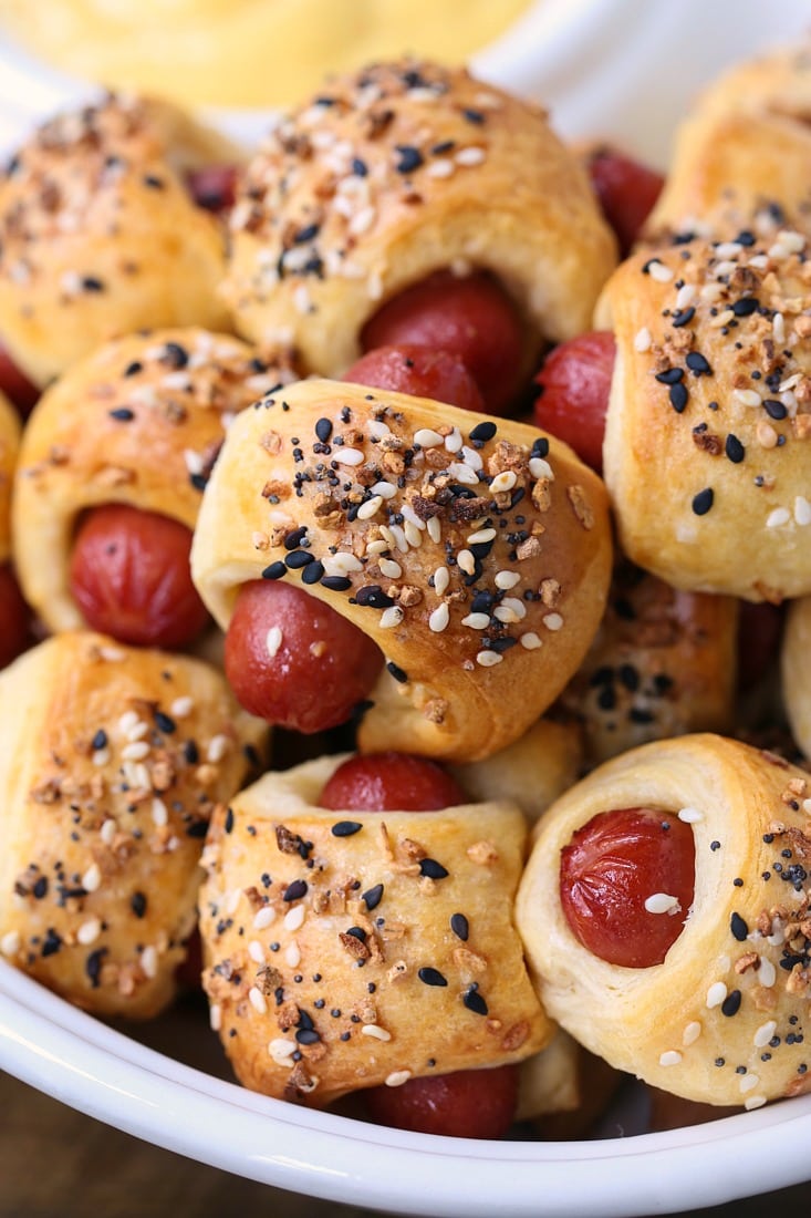 hot dogs wrapped in crescent dough with everything seasoning