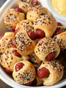 hot dogs wrapped in crescent rolls with seasoning