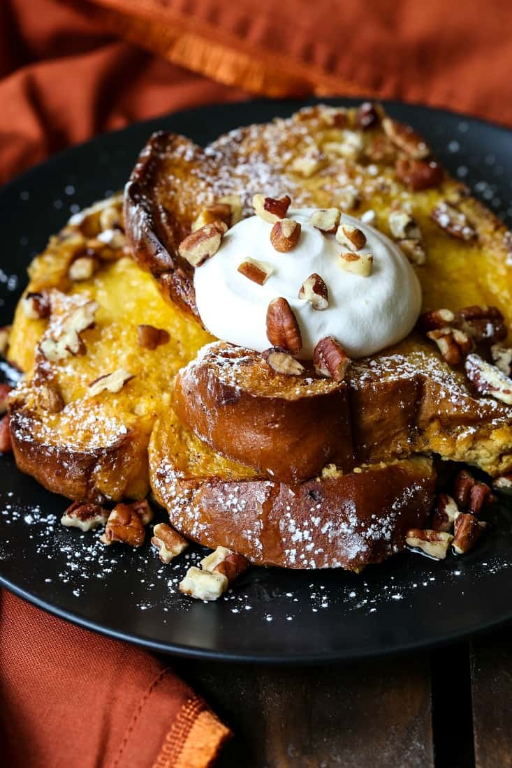 frehcn toast casserole with whipped cream and pecans