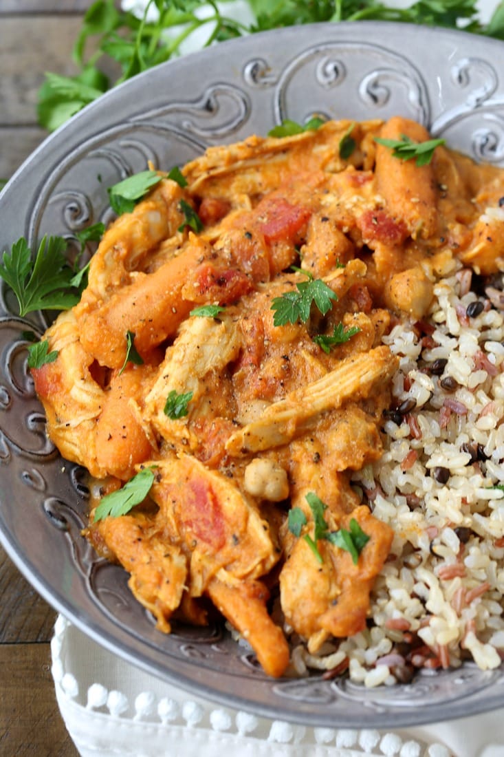 Pumpkin Chicken Stew with carrots and chick peas served over rice