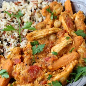 Chicken stew with pumpkin and vegetables served with rice