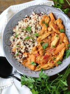 Pumpkin Chicken Stew with rice in grey bowl